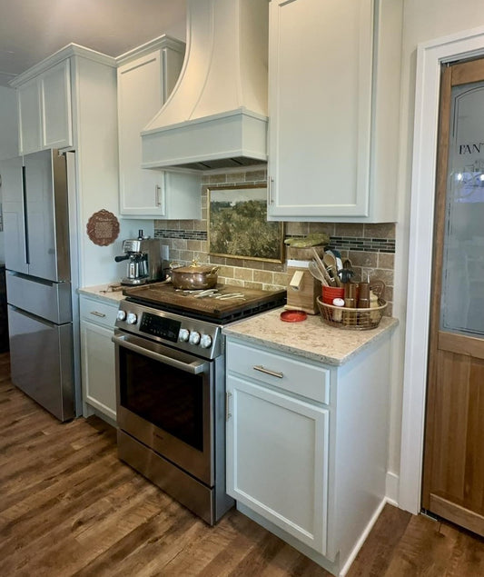 Kitchen cabinets painted with Rethunk Junk's