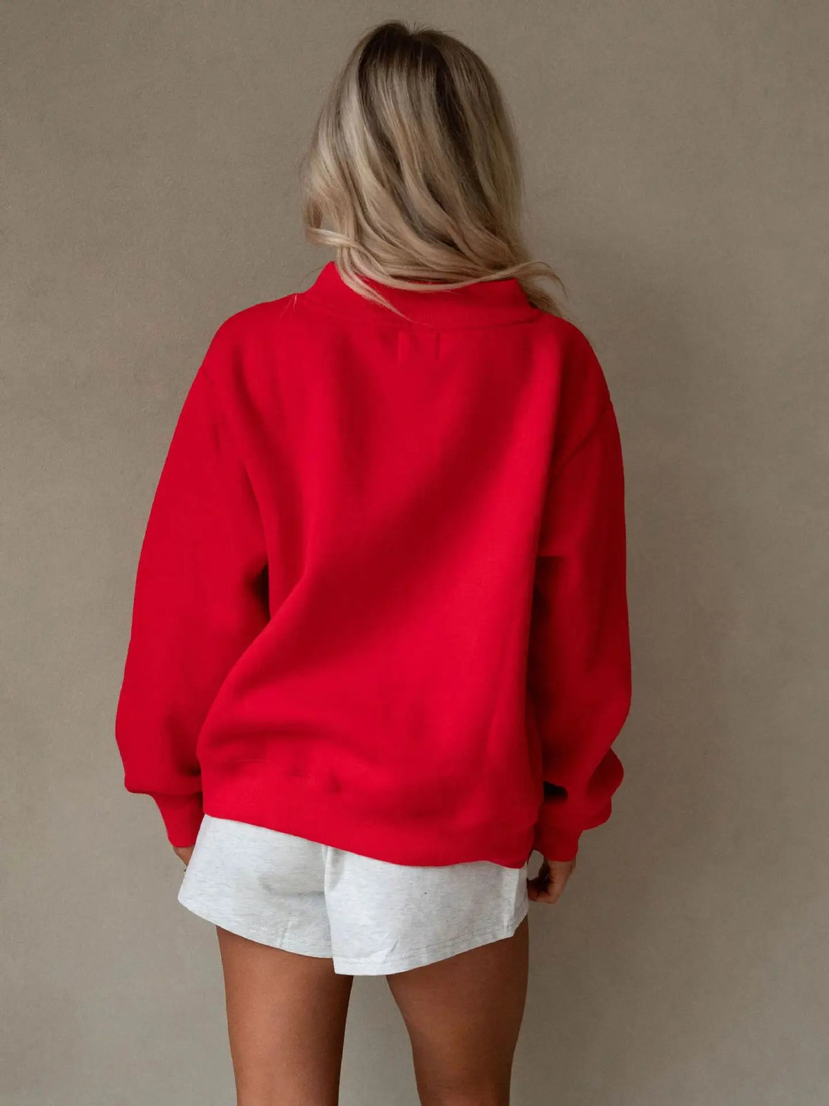 Red mock neck sweatshirt back view