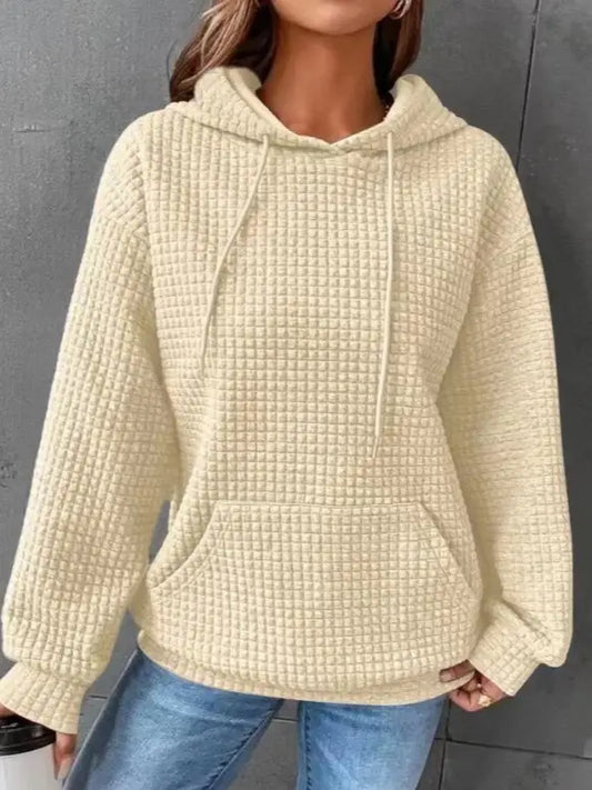 Cream waffle-texture pullover hoodie with drawstring hood and front pouch pocket