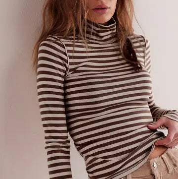 Brown and cream striped turtleneck top
